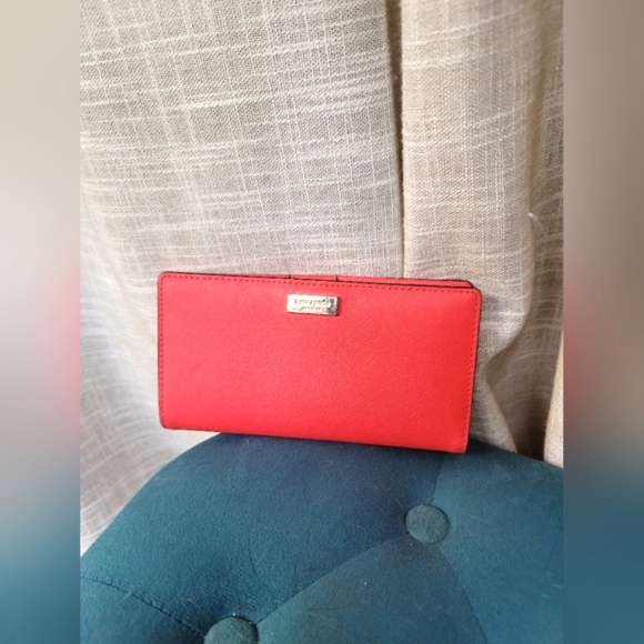 kate spade Handbags - Kate Spade Slim Bifold Red Leather Wallet
